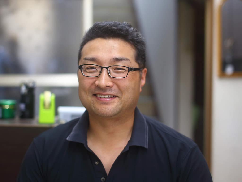 白友舎代表の人物写真(室蘭市クリーニング店)